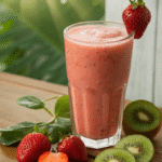 Kiwi Quencher Tropical Smoothie in glass with fruits